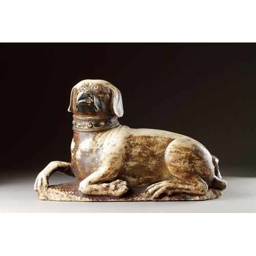 Very Rare Medieval English Alabaster Tomb Sculpture of a Hound Dog Seated on a Carved Mail Ground